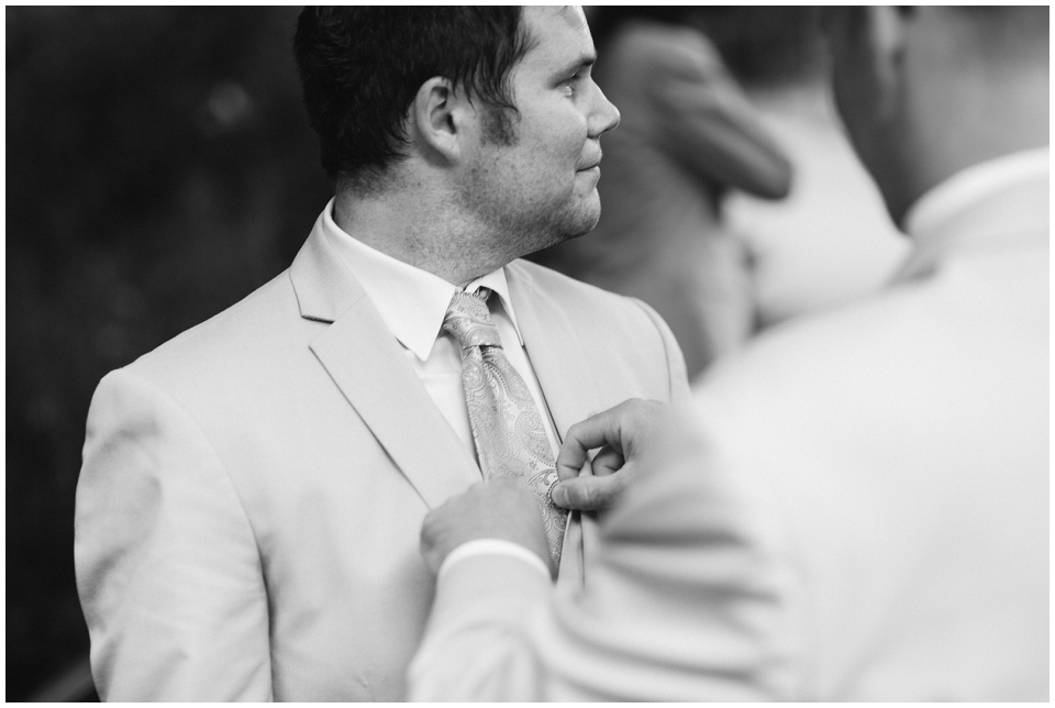 Elmwood park wedding groom fixing tie