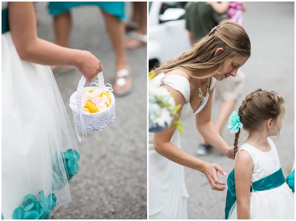 Bride adjusting flower girls sash